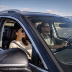 Car traveling on an open highway during a long road trip