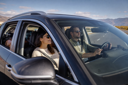 Car traveling on an open highway during a long road trip
